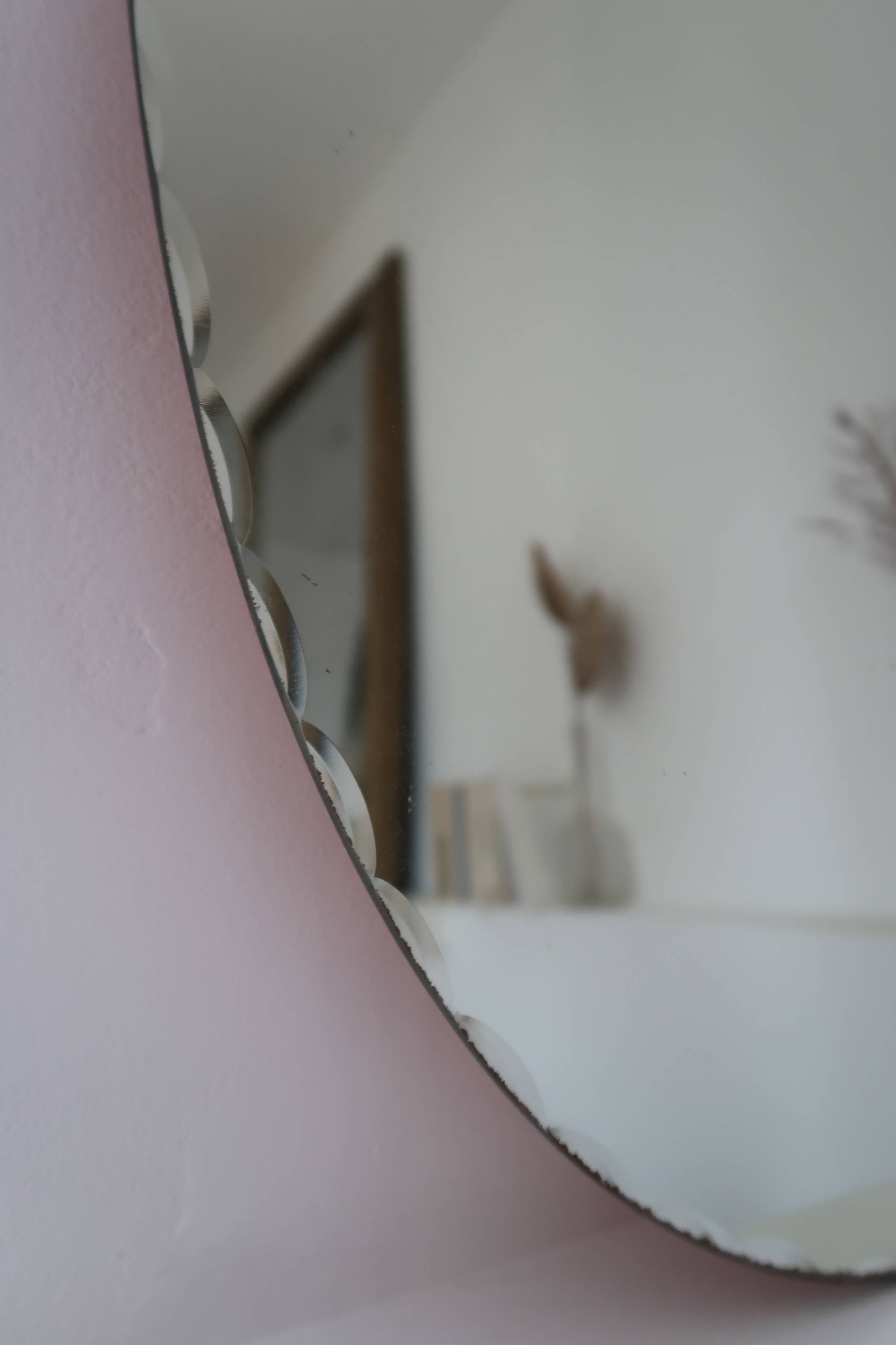 Vintage bevelled oval mirror