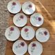 Set of 9 pink daisy dessert plates