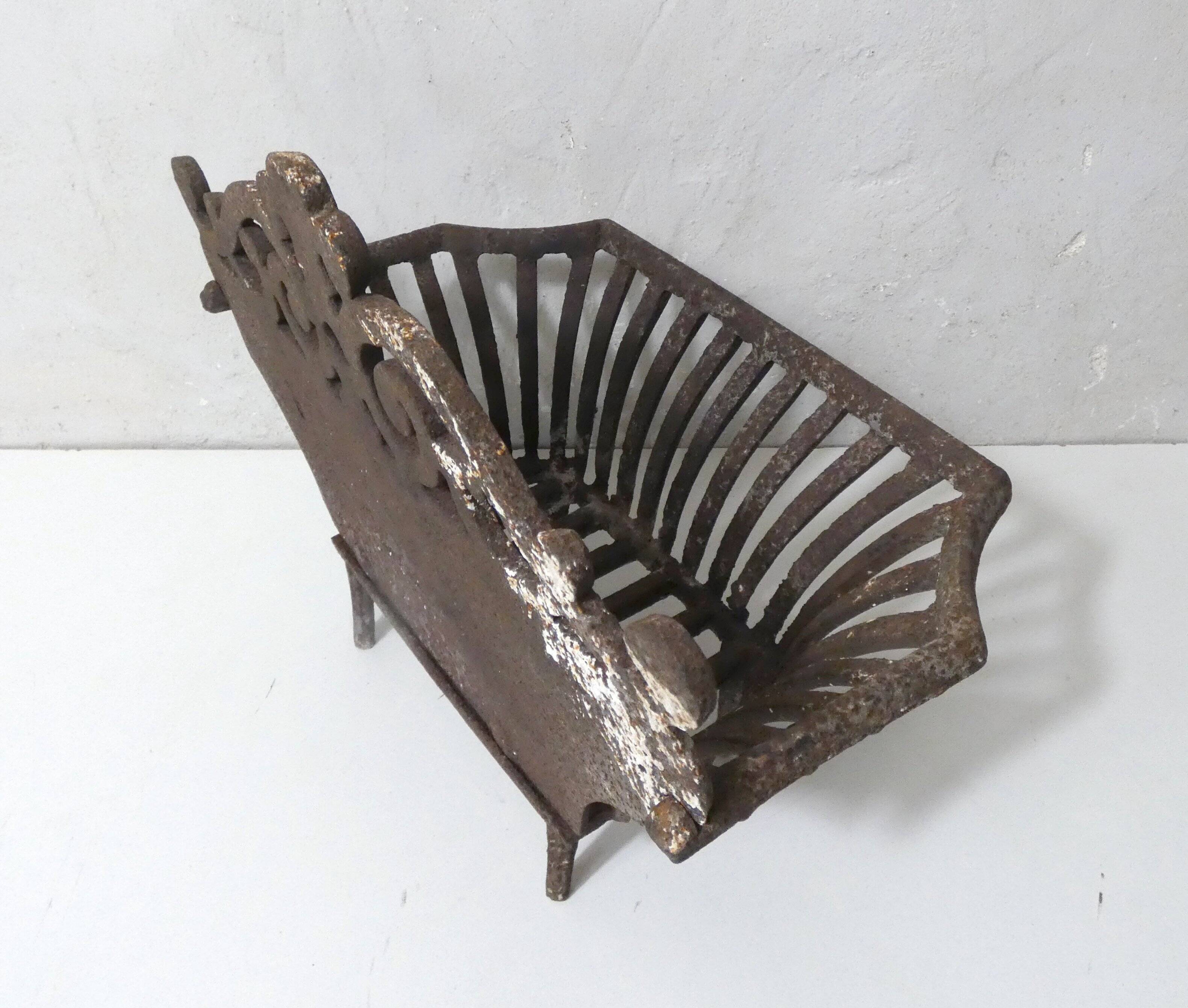 vintage cast iron log holder
