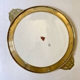 Art Nouveau plate in earthenware with a brass frame