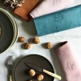 Set of four old damask towels tinted in multiple colors