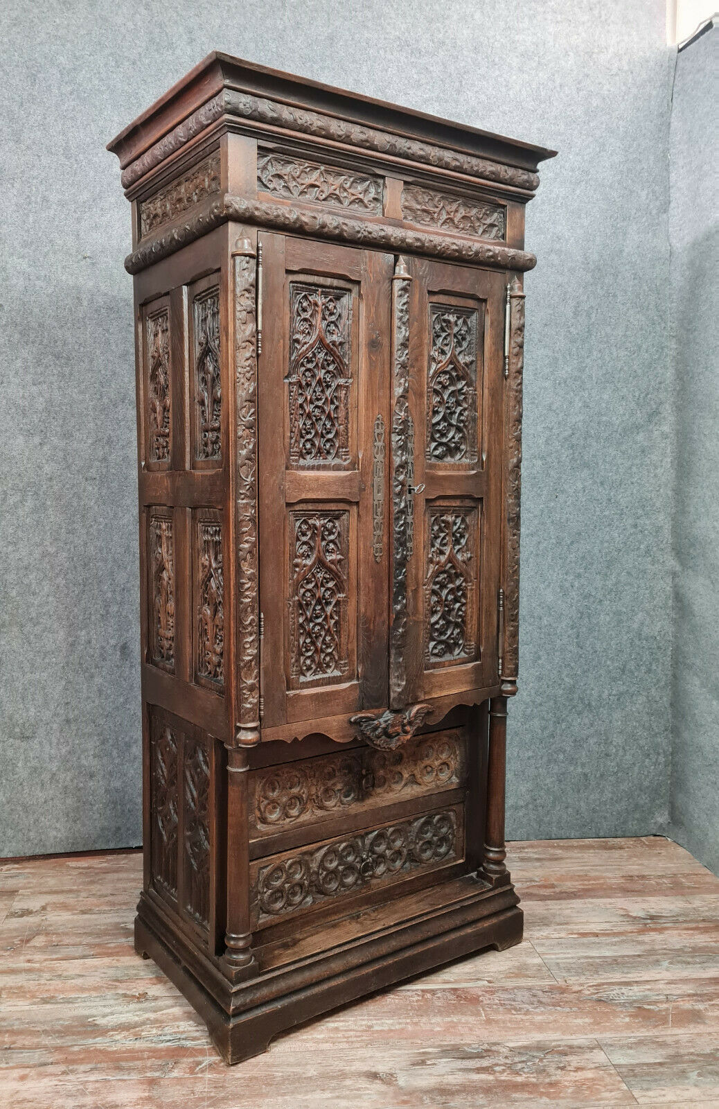 Gothic Renaissance style cabinet with solid oak putto around 1850