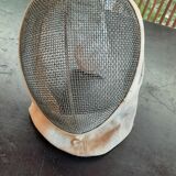 Pair of old fencing mask and foil