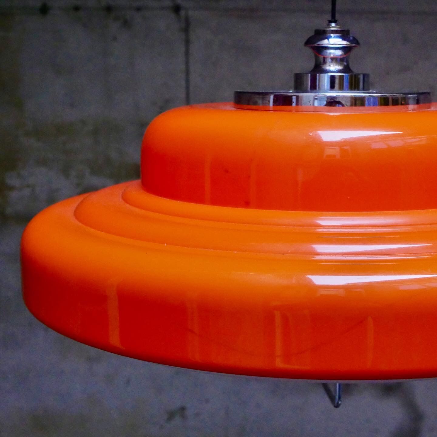 Orange space age suspension