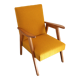 Curly yellow Scandinavian armchair