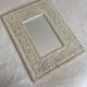 Miroir en bois sculpté