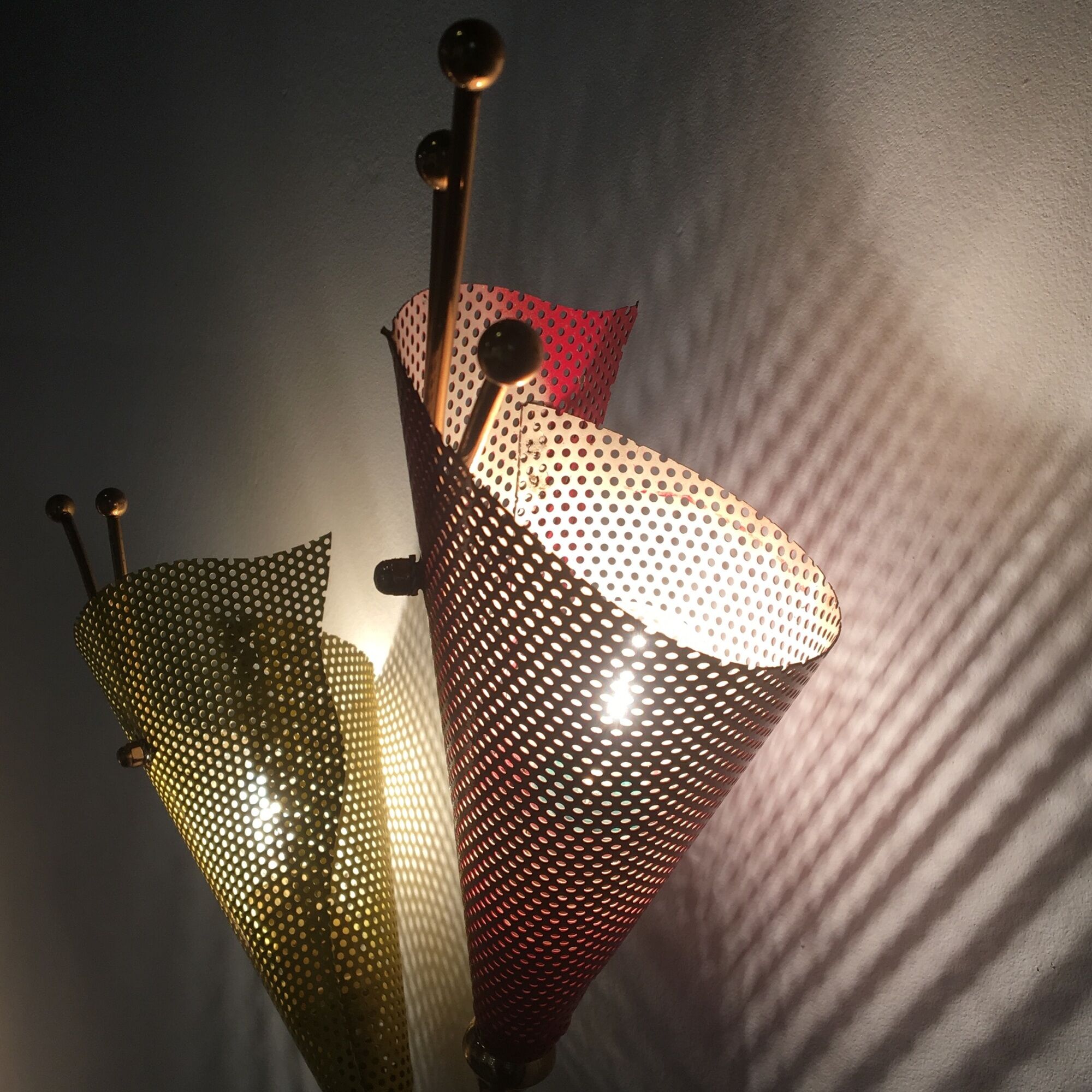 Pair of wall lamps metal perforated color, France 1950