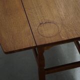 Modern Danish folding side table in solid oak, mid-20th century.