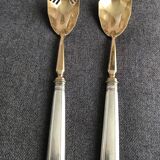 Pair of serving spoons in silver hallmark neck brace
