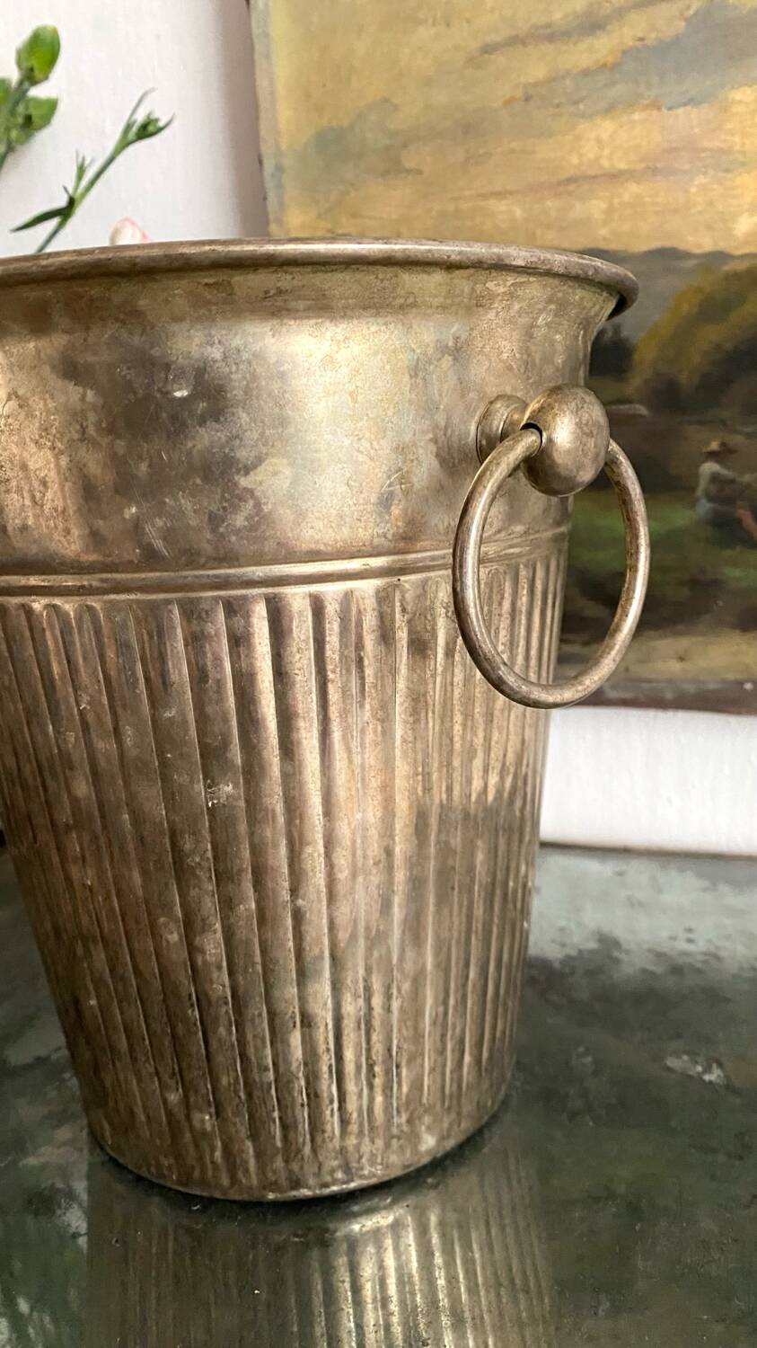 Patinated silver metal champagne bucket
