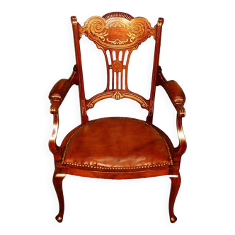 19th century armchair in leather and rosewood inlaid with brass and rosewood