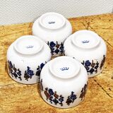 4 tea cups with delicate floral pattern