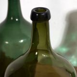 Antique green demijohns (c.1920). Set of 3 pieces