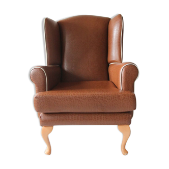 Vintage brown faux wingback chair