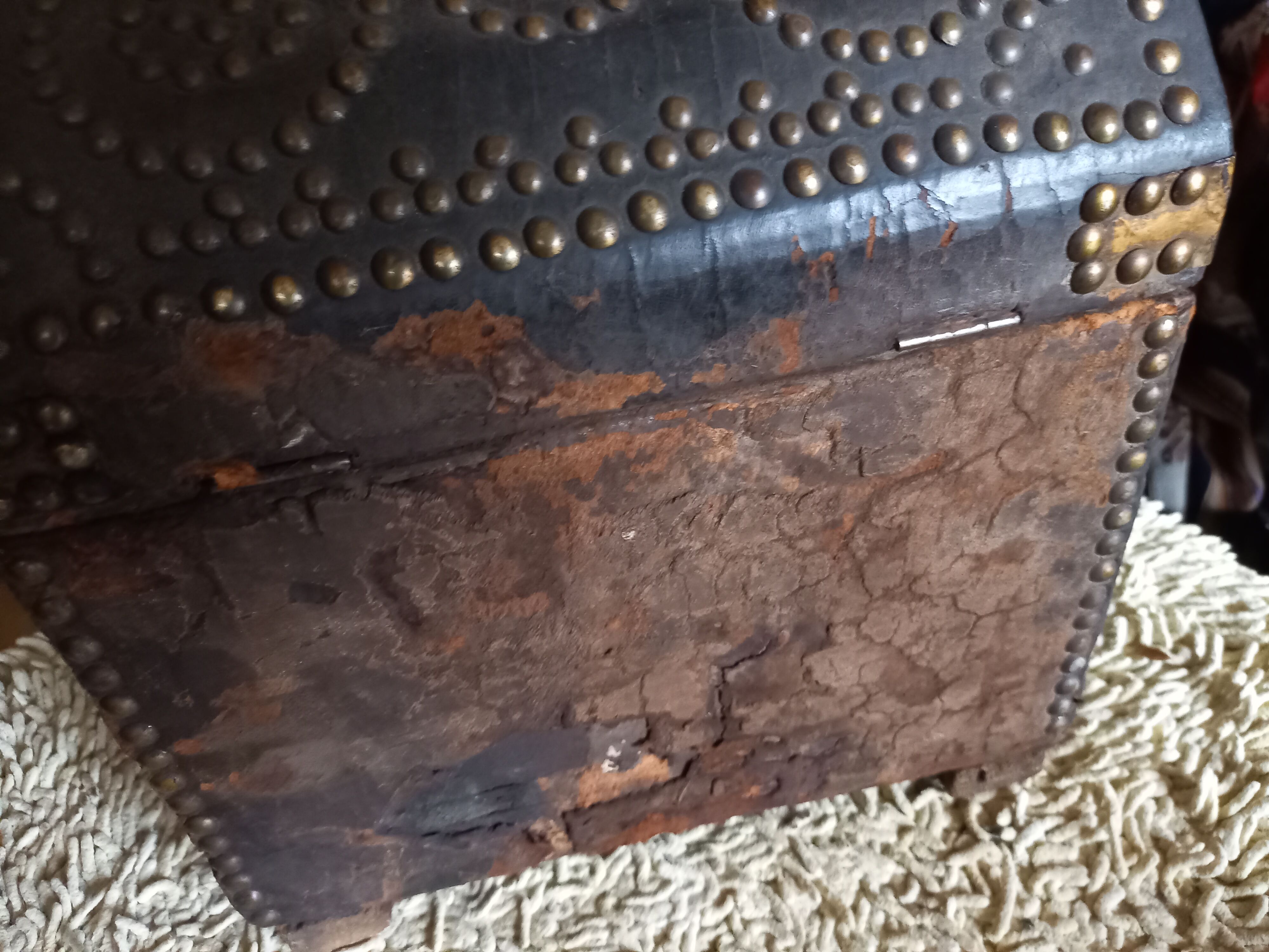 Old chest wood and studded leather