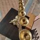 Antique candle holder in bronze and brass nineteenth century.