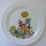 Suite of twelve "vintage" table plates with floral decoration