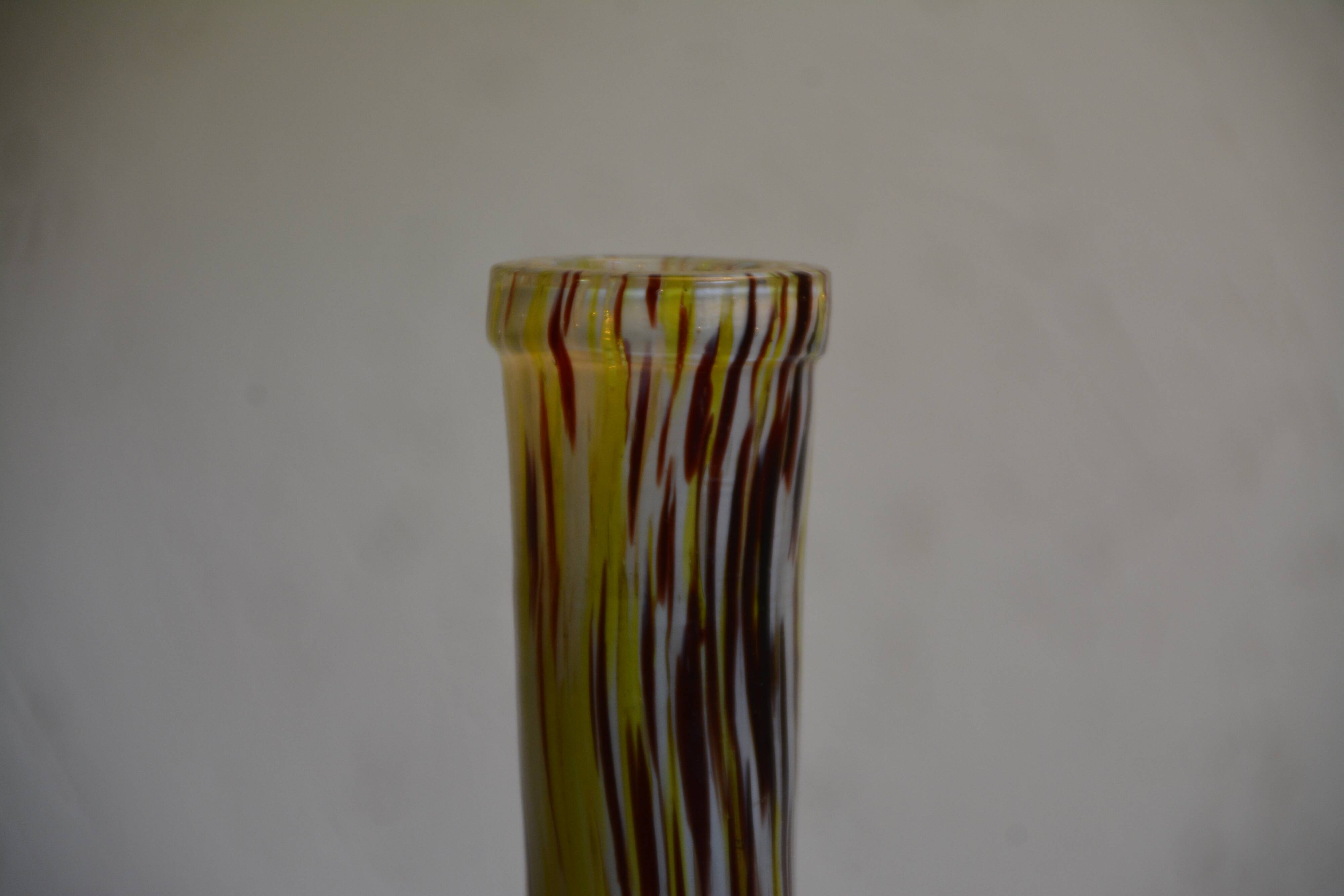 Yellow and white speckled decanter