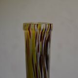 Yellow and white speckled decanter