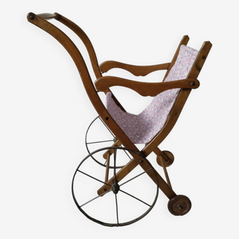 Old stroller for wooden doll