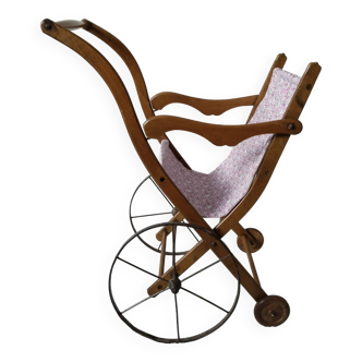 Old stroller for wooden doll