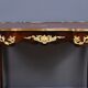 Rosewood, mahogany, and rosewood desk-table, Louis XV style – early 20th century.
