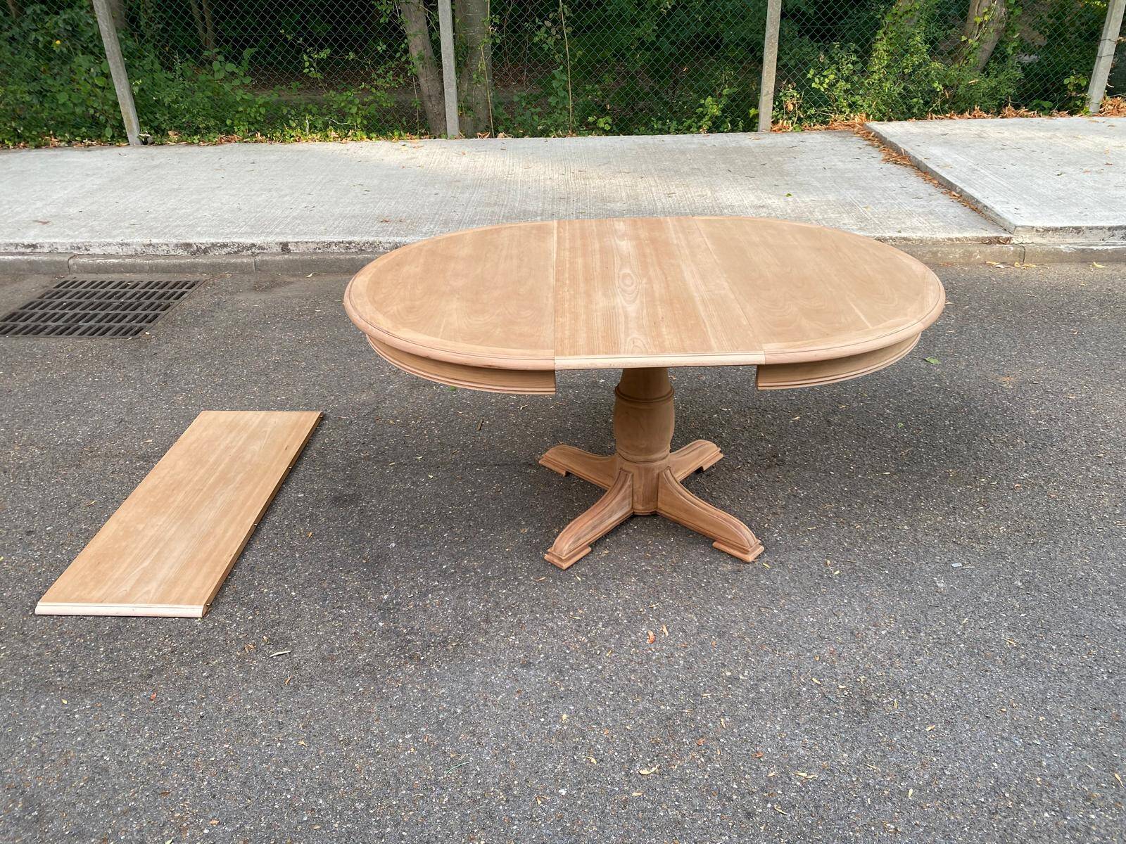 Large extendable round dining table stripped with a central wooden leg 110-198cm.