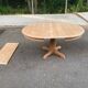 Large extendable round dining table stripped with a central wooden leg 110-198cm.