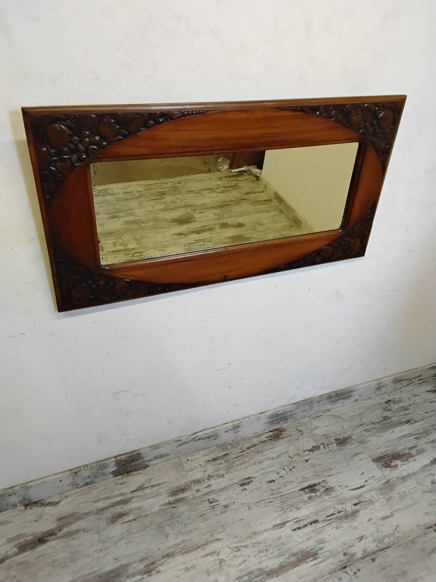 Art Deco mirror with a wooden frame
