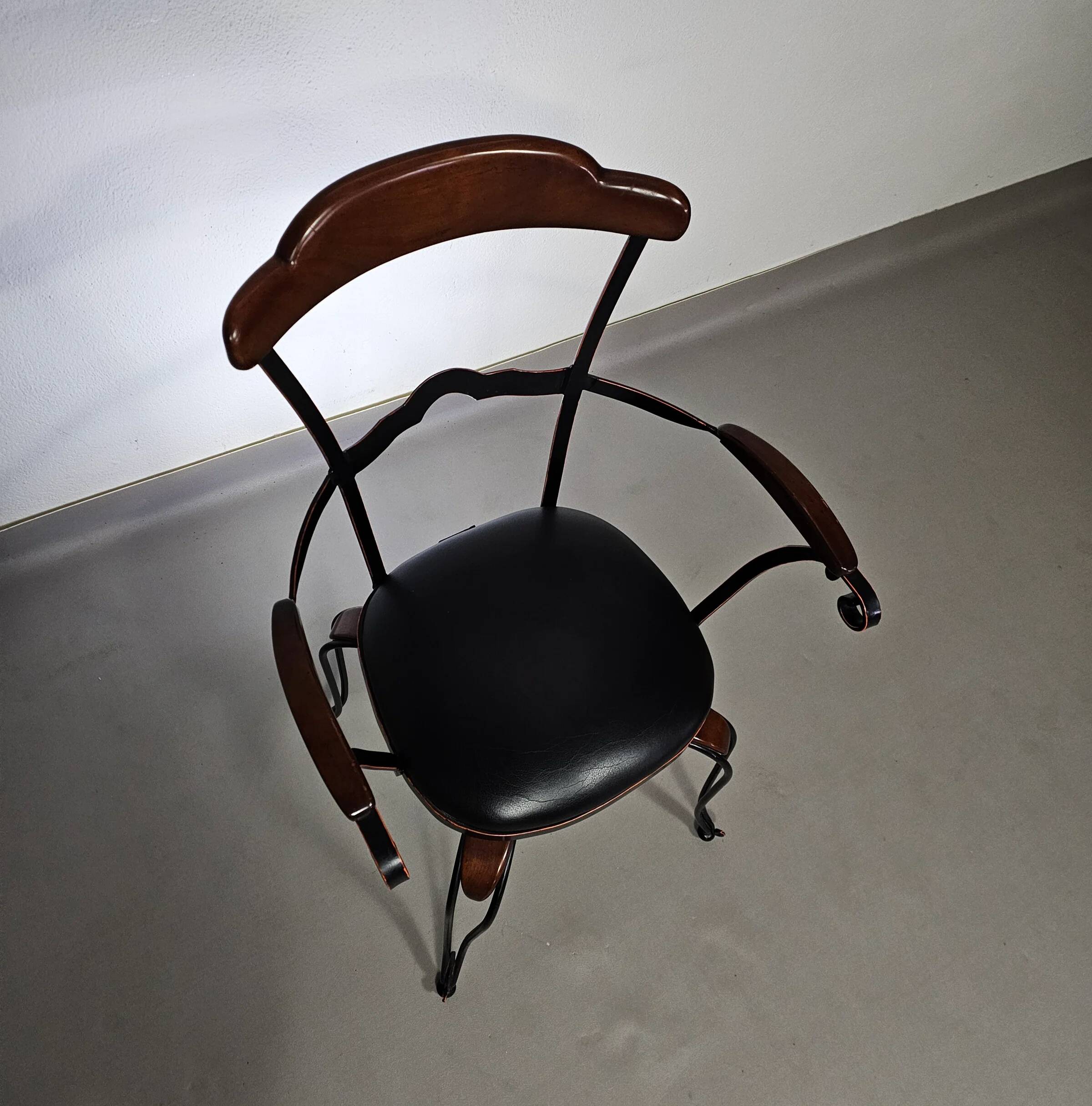 Italian postmodern turnable wrought iron dining chairs with leather seats