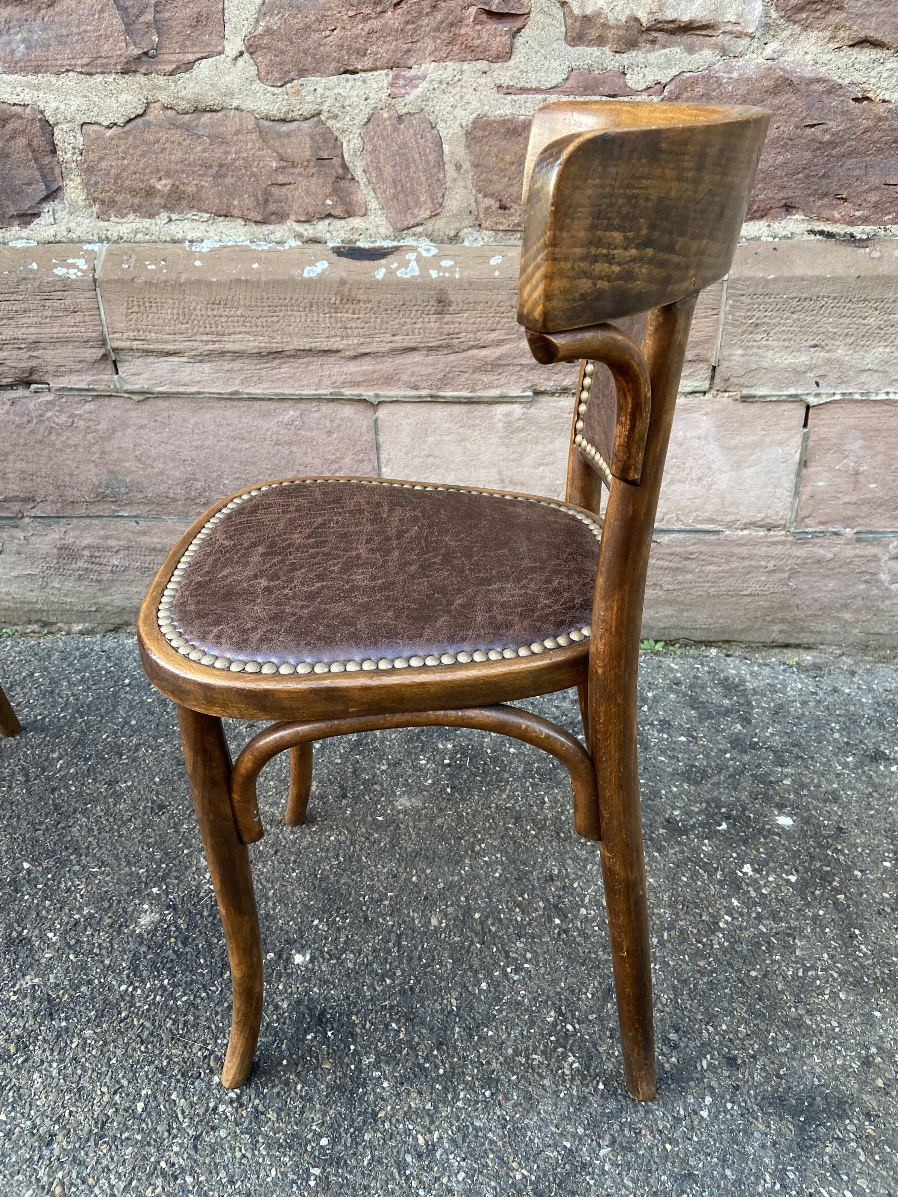 Pair of restaurant chairs bent wood imitation leather 50s