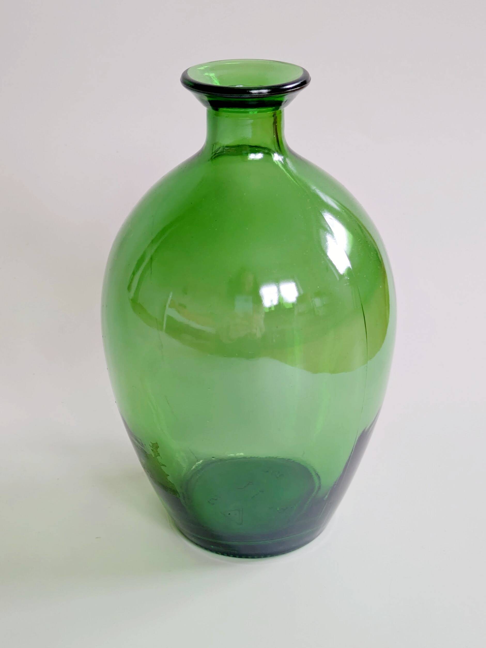 Vintage green glass bottle vase, decorative soliflore.