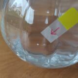 Glass ball vase with corolla