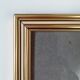 Photo frame under glass, gilded wood