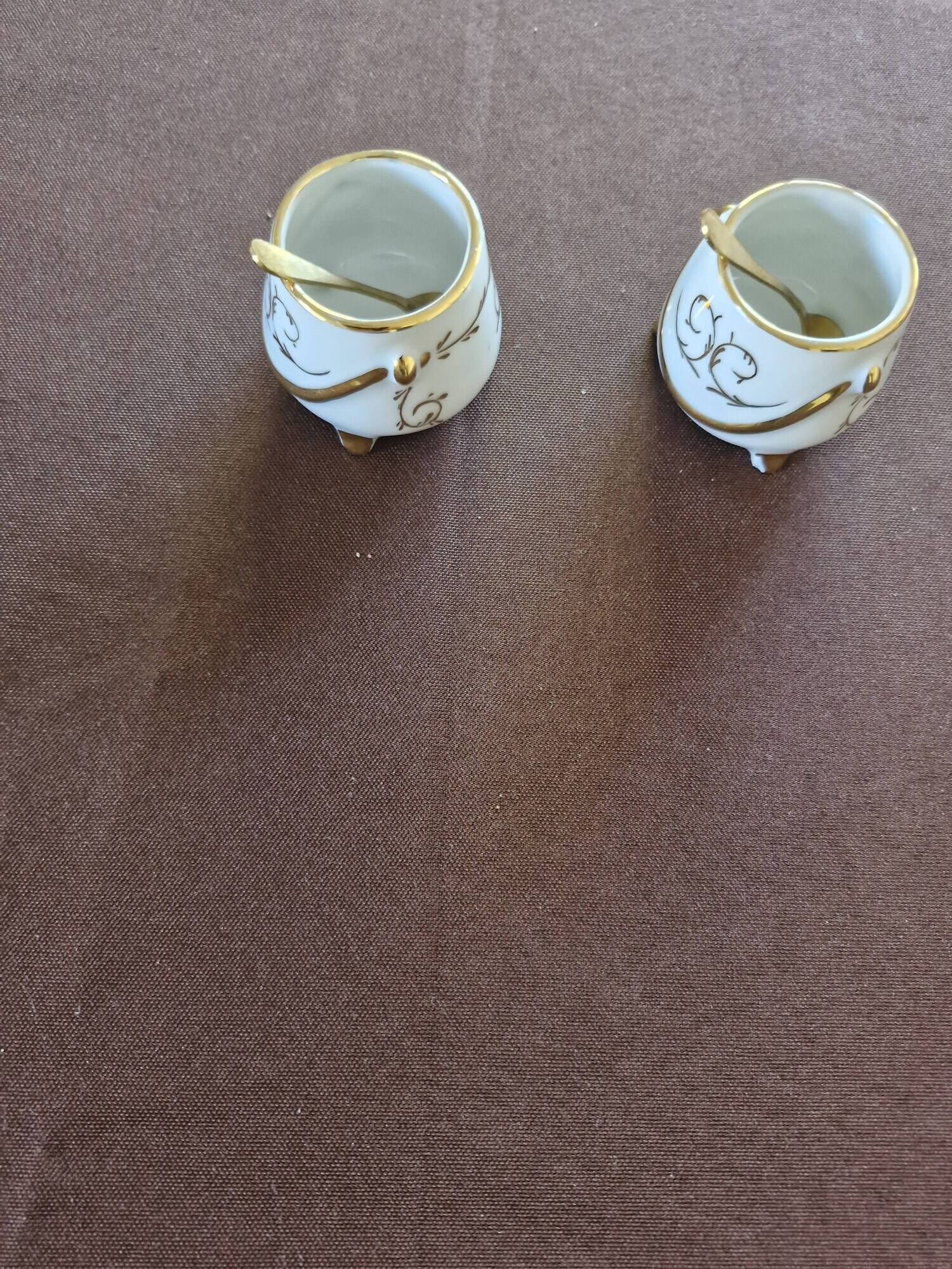 Vintage porcelain salt and pepper shakers.