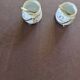 Vintage porcelain salt and pepper shakers.