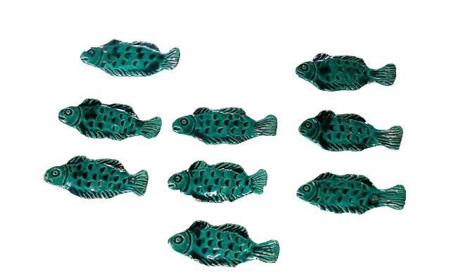 9 knife holders in green earthenware in the shape of a fish