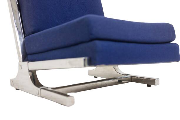 Pair of armchairs and pouf in chrome steel. 1970s, Valérian Rybar.