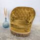 Buttoned frog armchair