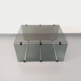 Vintage coffee table in smoked glass, black metal and cast aluminum