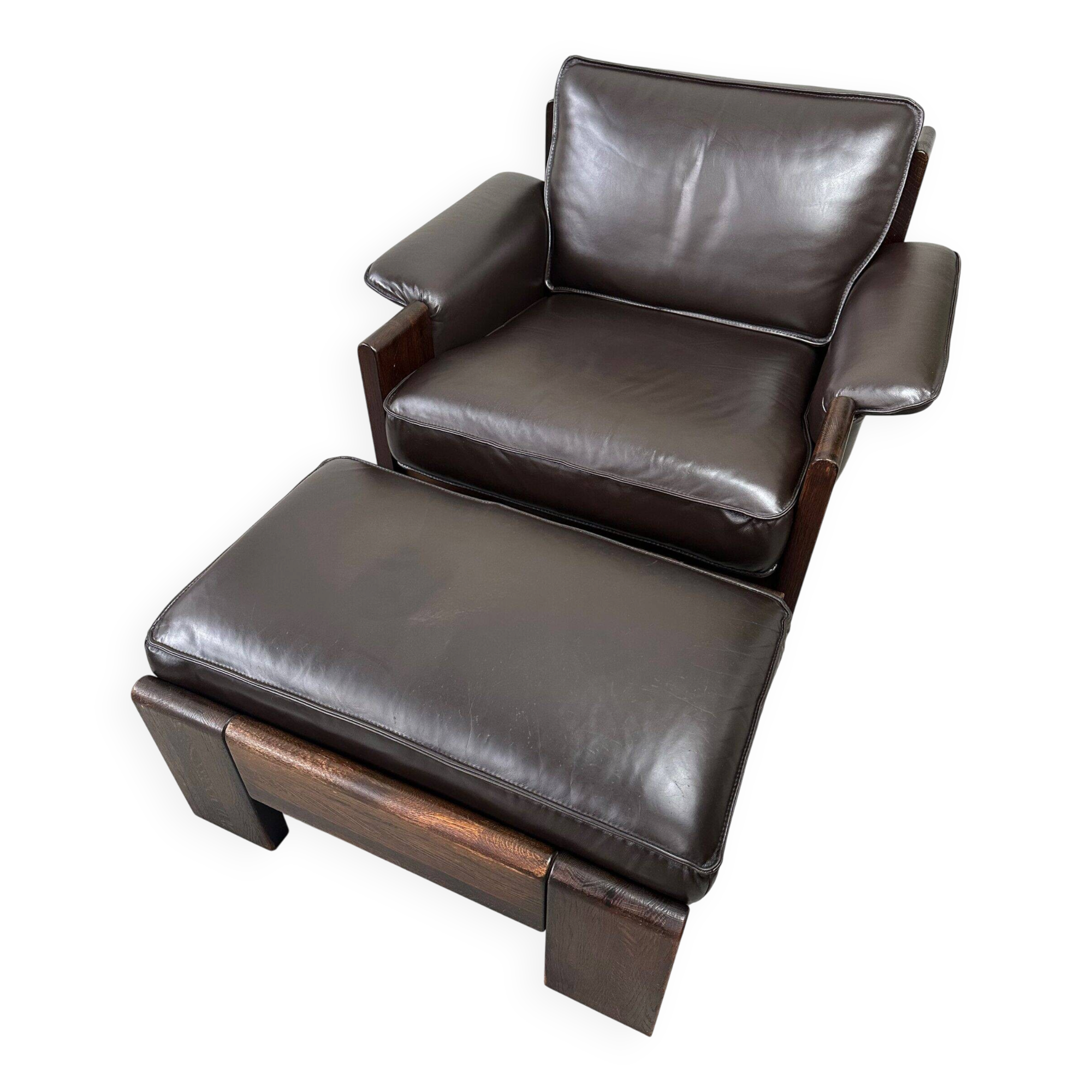 Vintage Leolux brown leather/oak lounge chair and ottoman by Harry de Groot – 1970