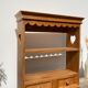 Wall shelf in raw wood with drawers and openwork hearts