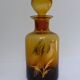 Decorated and signed perfume bottle, brown glass, painted "by hand Clary Paris"