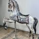Carved and patinated wooden carousel horse