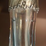 Molded glass carafe with silver frame