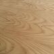 Renovated oval Scandinavian extendable dining table in wood with a central leg.