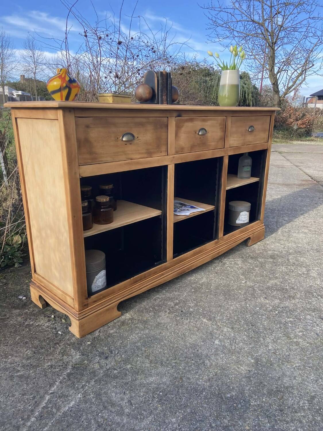 Raw wooden buffet without doors