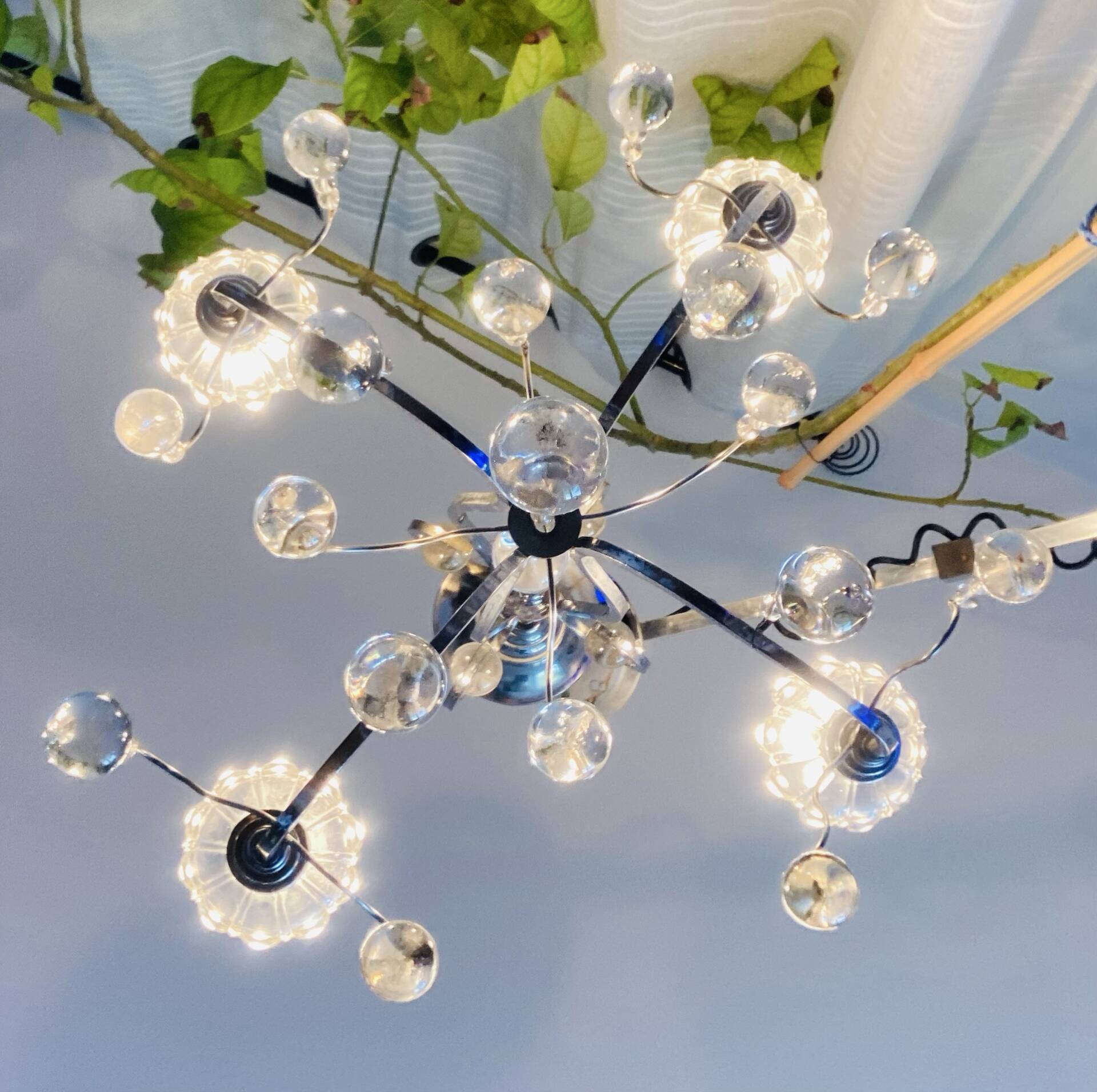 Art Deco chandelier from the early 20th century in chrome brass, with glass pendants.