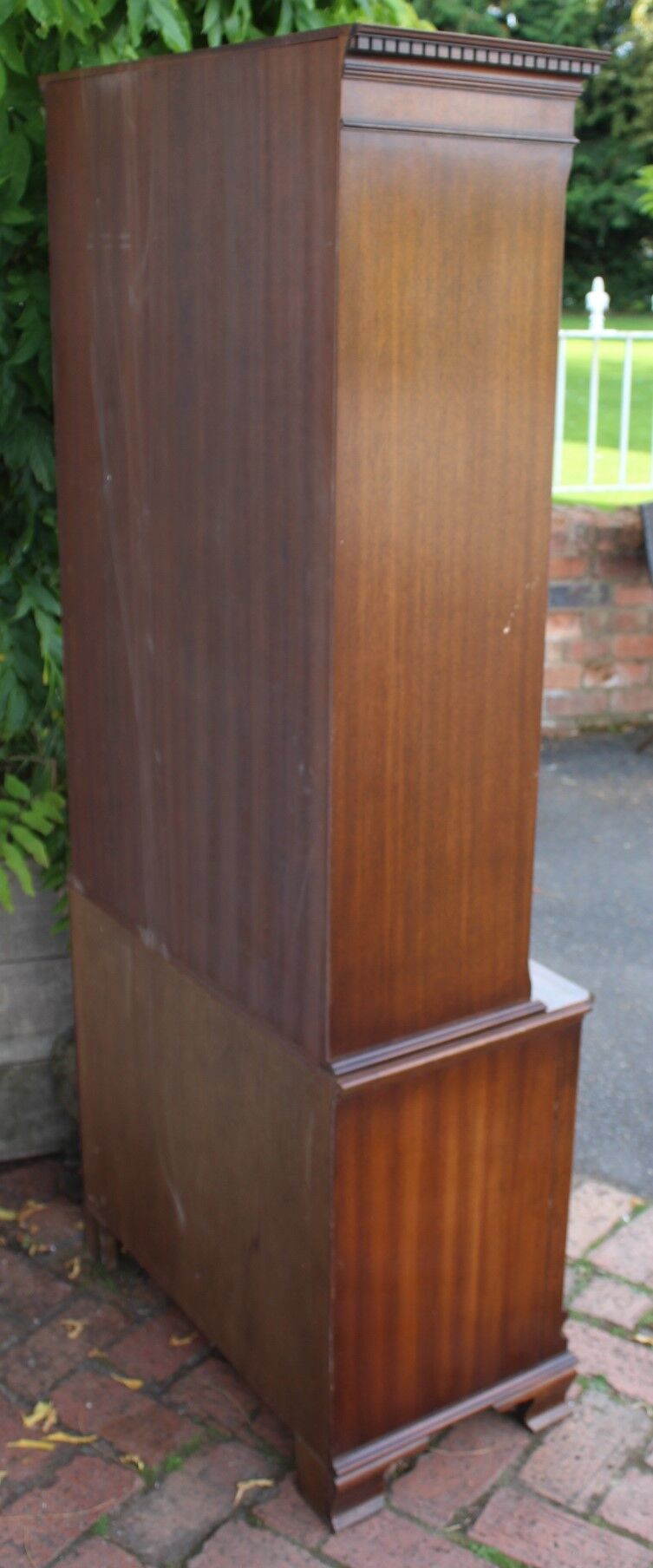 Mahogany bookcase with brushing slide