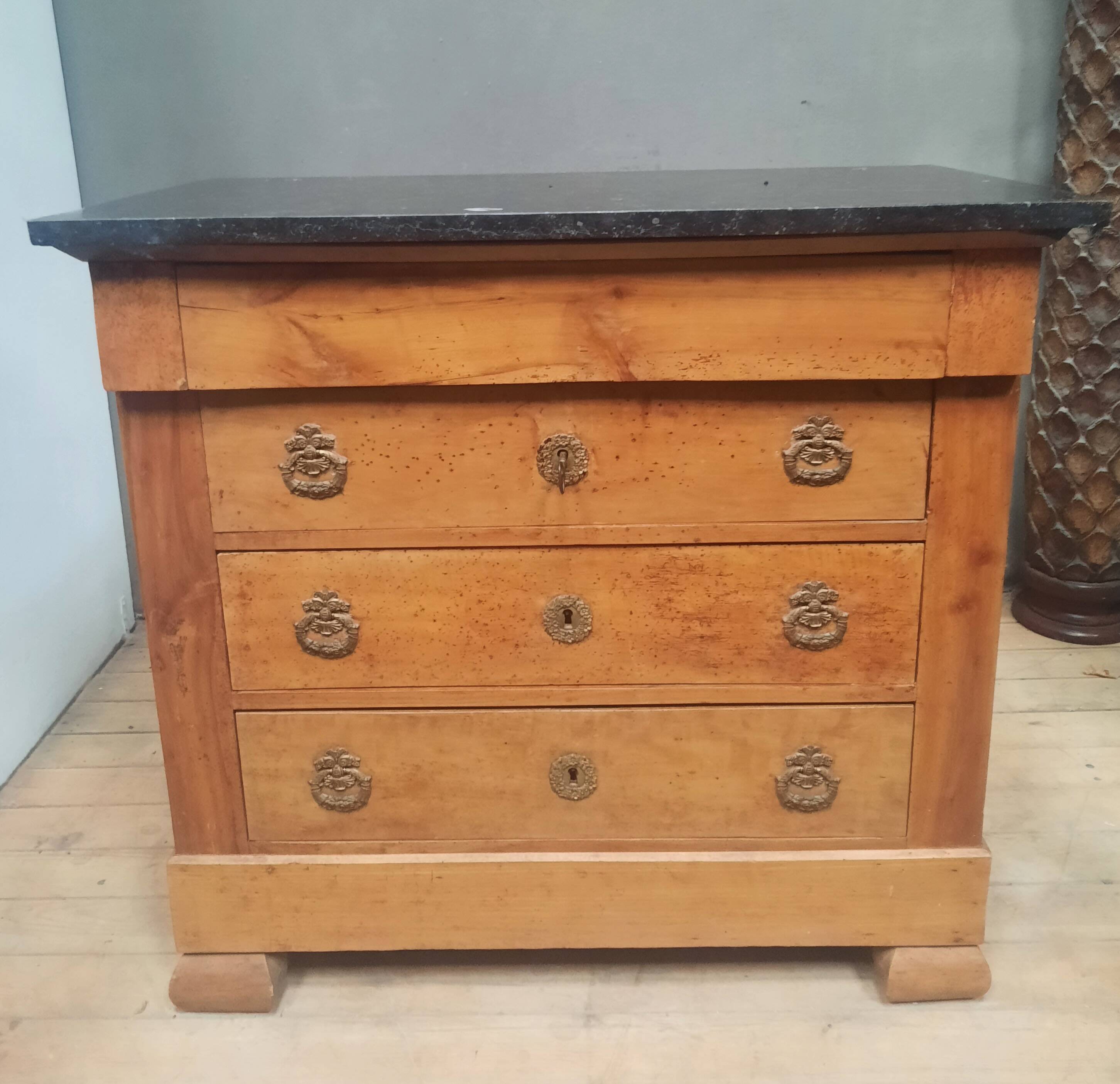 Nineteenth-century commode with marble top.